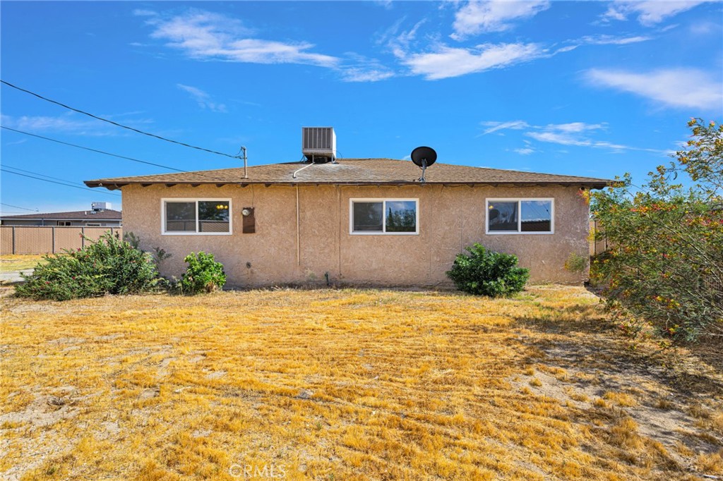 2567 Perth Court Barstow, CA 92311 - Photo 43 of 56 a front view of a house with a yard
