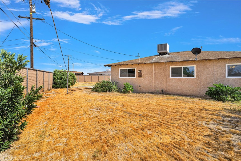 2567 Perth Court Barstow, CA 92311 - Photo 44 of 56 a bathroom with a sink and a yard