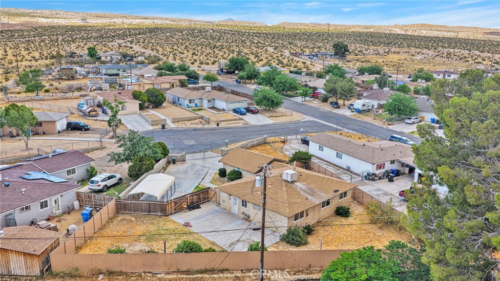 2567 Perth Court Barstow, CA 92311 - Photo 51 of 56 an aerial view of residential houses with outdoor space