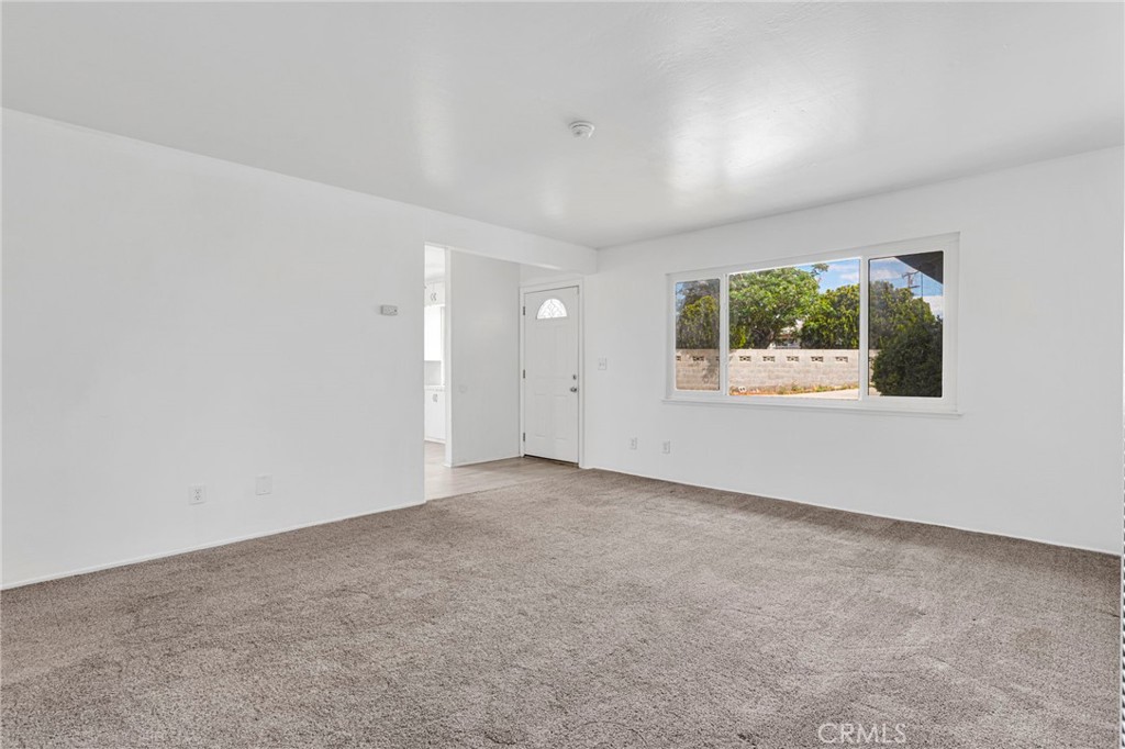 2567 Perth Court Barstow, CA 92311 - Photo 7 of 56 an empty room with a window