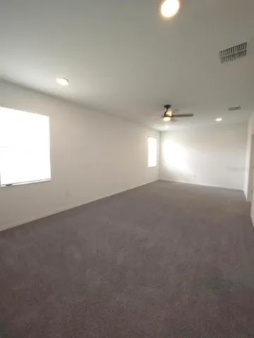 a view of a room with an empty space