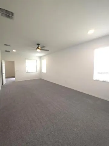 a view of a room with racks on the wall