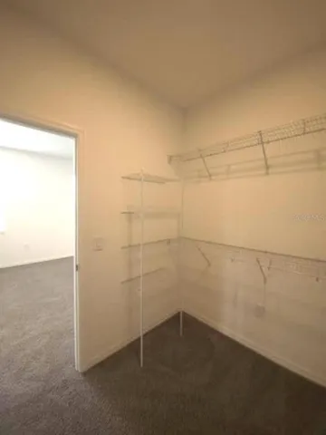 a spacious bathroom with a tub a shower and a sink