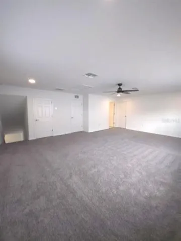 a view of a room with an empty space