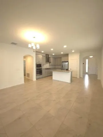 a view of a kitchen and a window