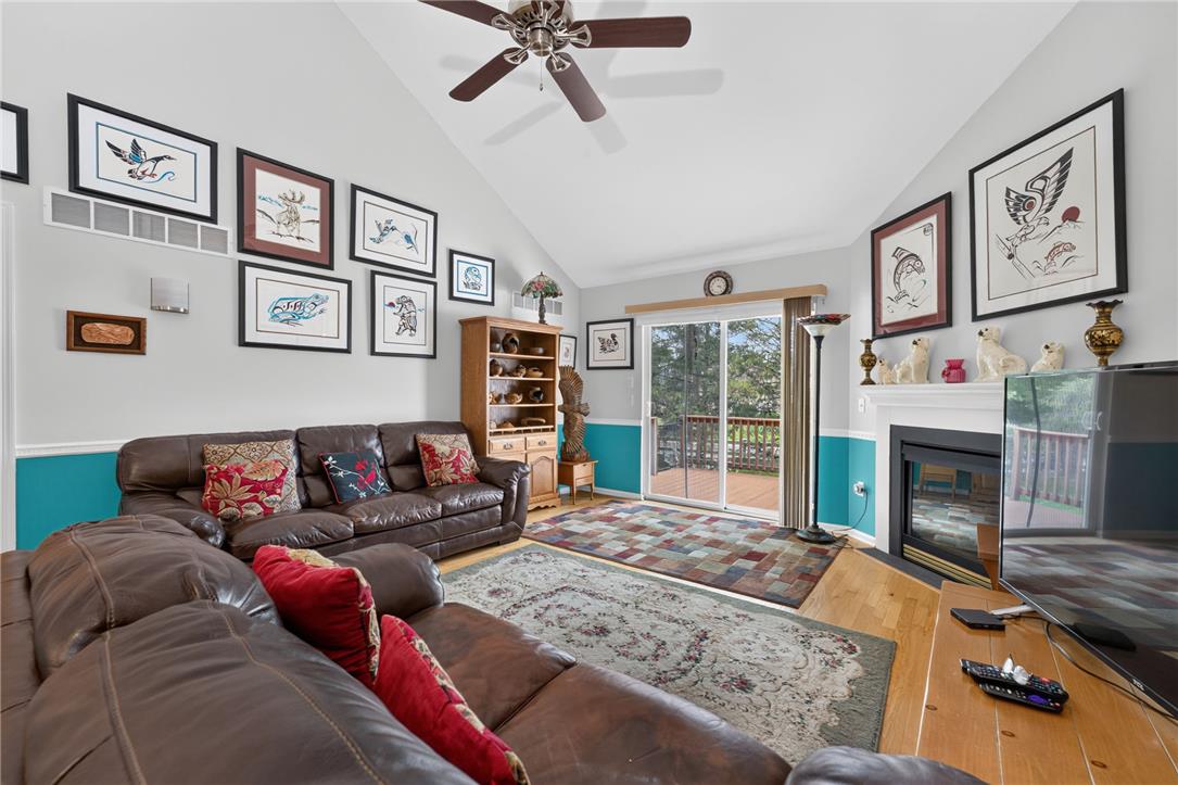 198 Park Ridge Drive Easton, PA 18040 - Photo 9 of 28 A great room offers vaulted ceilings and a warm, inviting fireplace perfect for gatherings.
