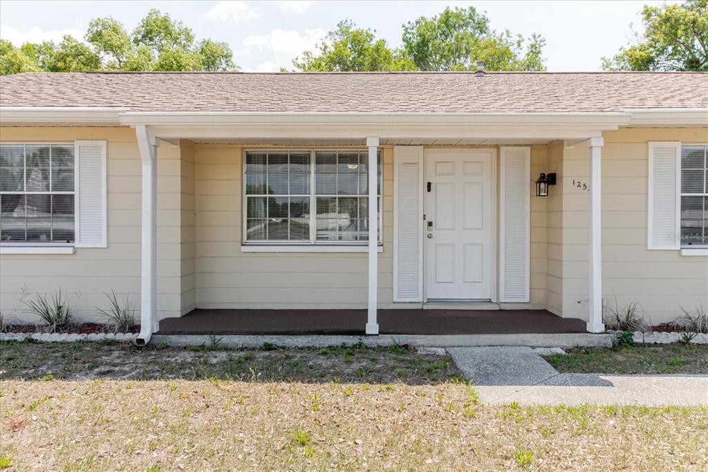 12526 Elgin Boulevard Spring Hill, FL 34609 - Photo 5 of 33 a front view of a house