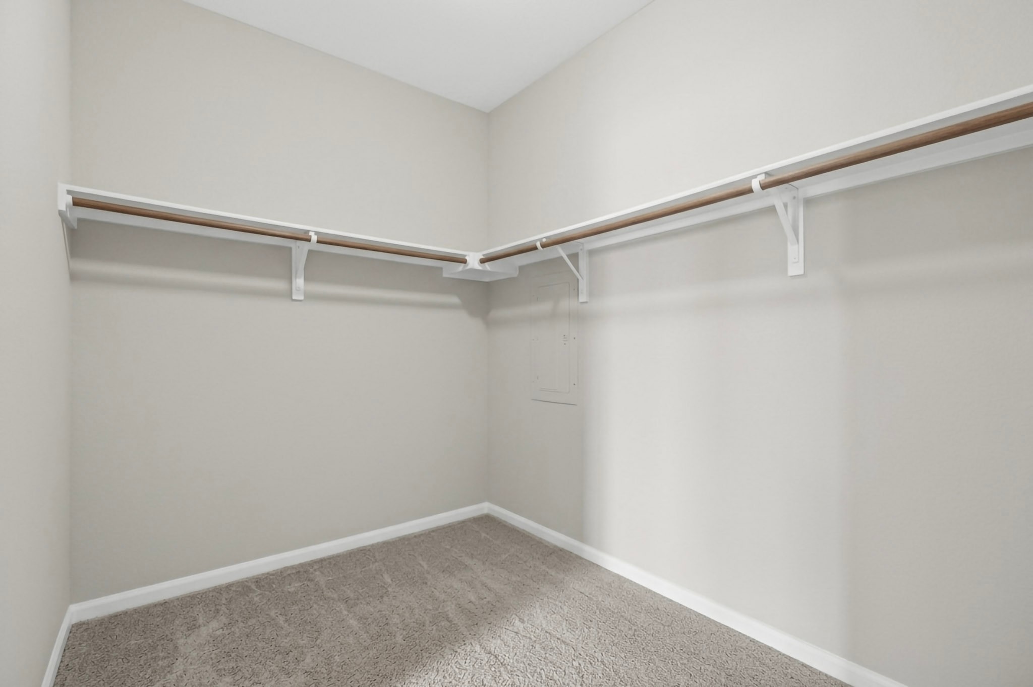 6920 Ranchito Drive Austin, TX 78744 - Photo 2 of 4 A generously sized walk-in closet with ample hanging space and soft carpeting provides organized storage.