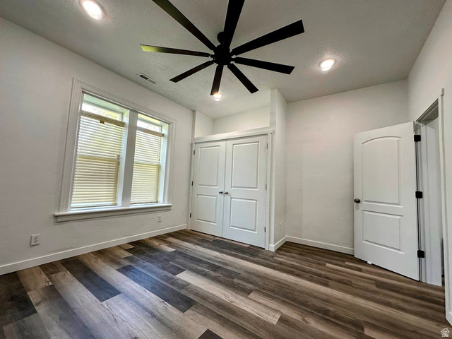 629 North 100 East Logan, UT 84321 - Photo 9 of 11 Room featuring wood-finish flooring, recessed lighting, and a contemporary ceiling fan