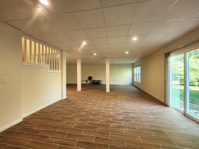 a view of a hallway with a large window