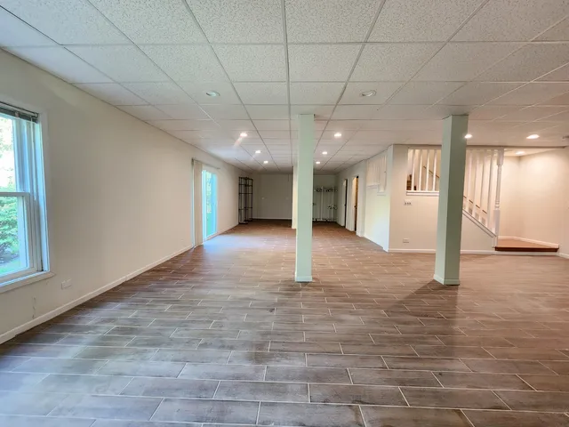 a view of a hallway with a window