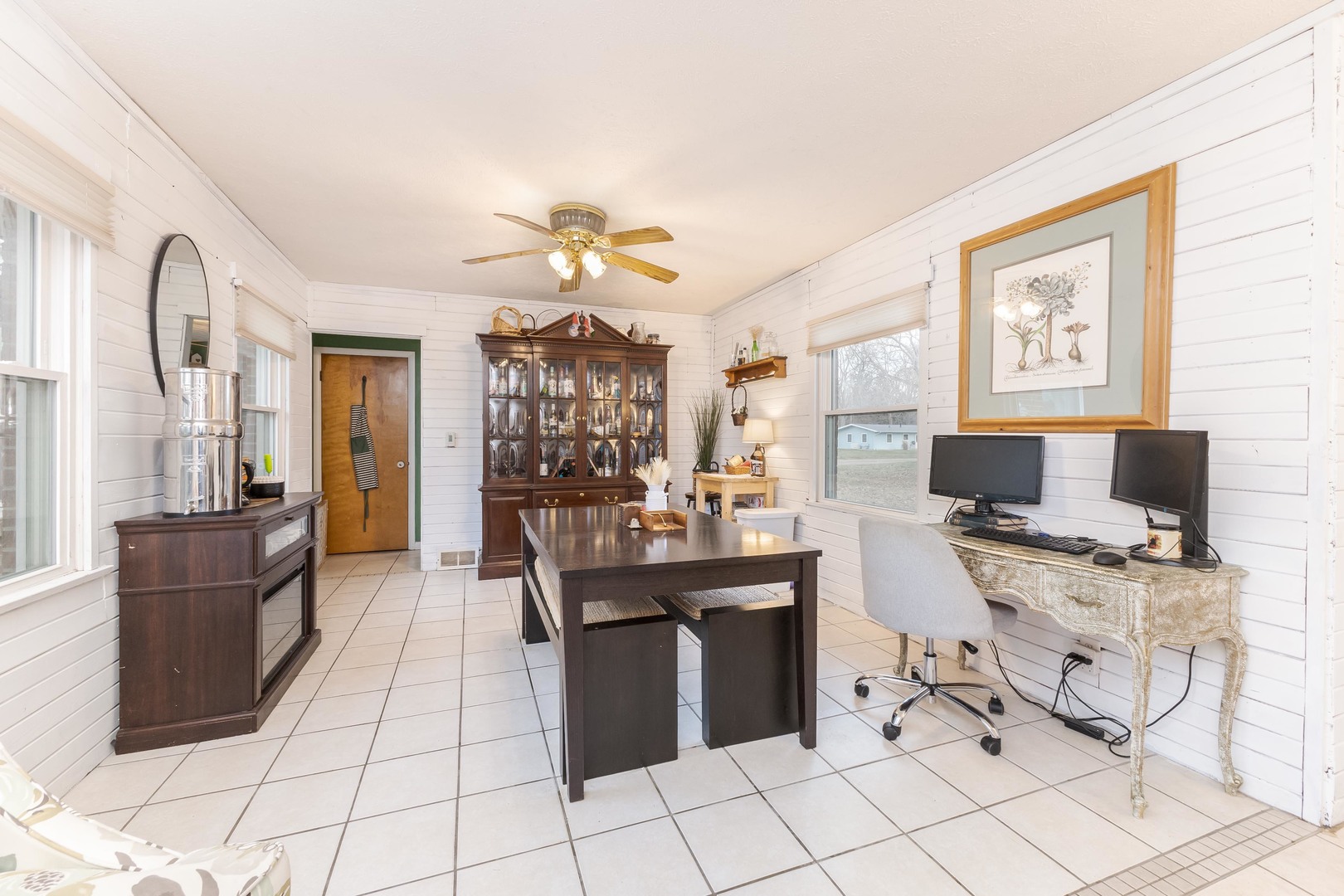 1903 Croxton Avenue Bloomington, IL 61701 - Photo 16 of 55 a view of a workspace with furniture and a window