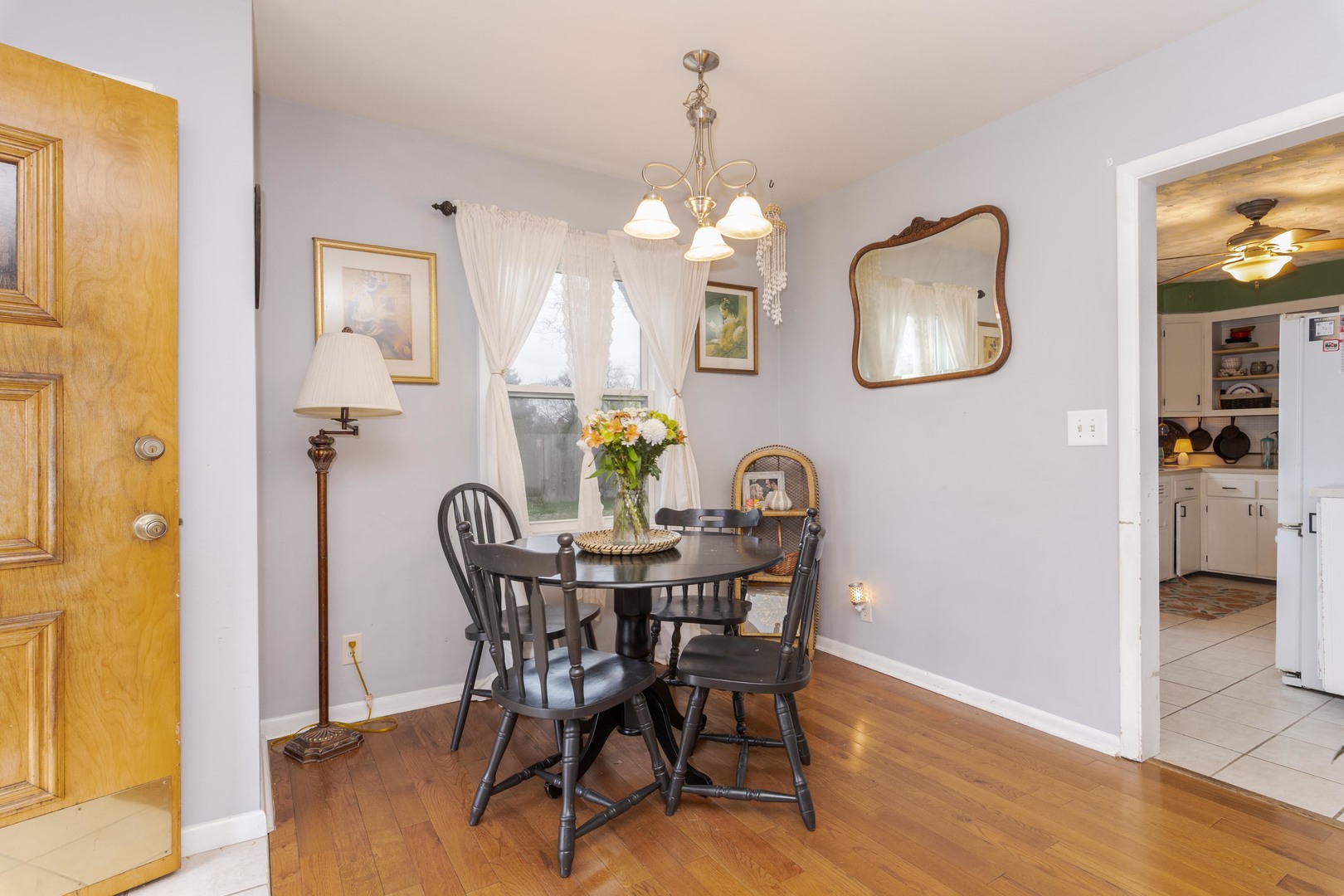 1903 Croxton Avenue Bloomington, IL 61701 - Photo 21 of 55 a view of a dining room with furniture and wooden floor