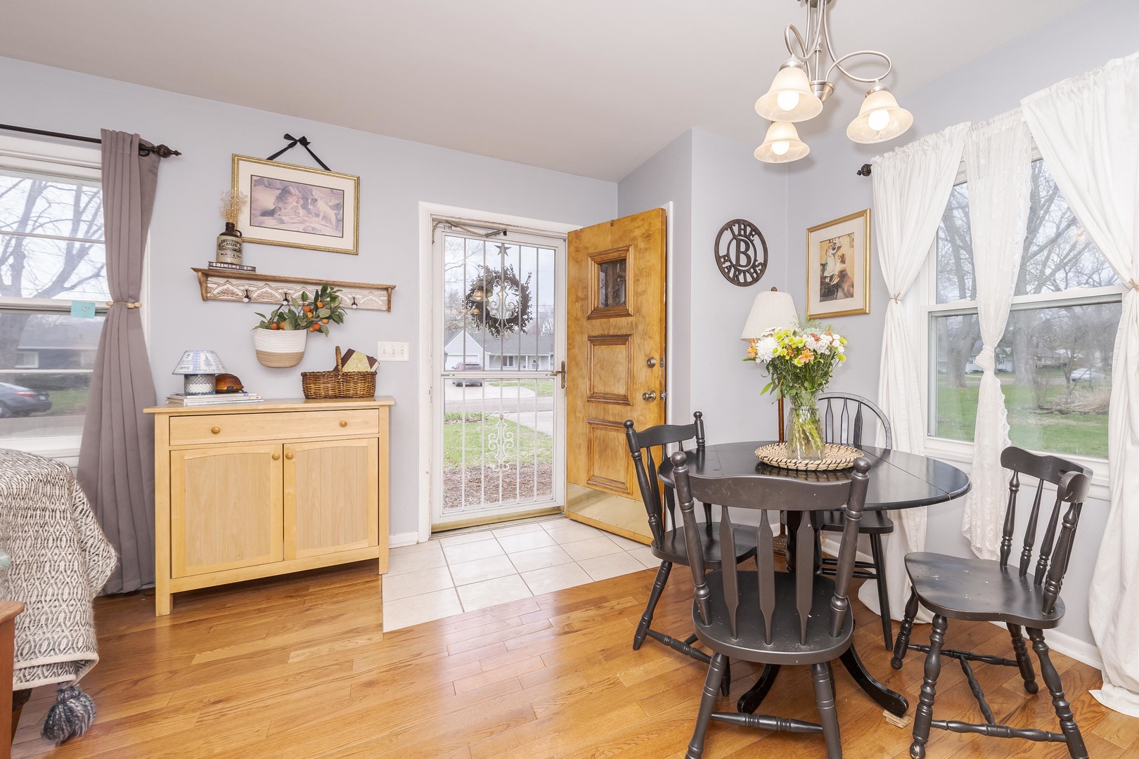 1903 Croxton Avenue Bloomington, IL 61701 - Photo 22 of 55 a view of a dining room with furniture and chandelier