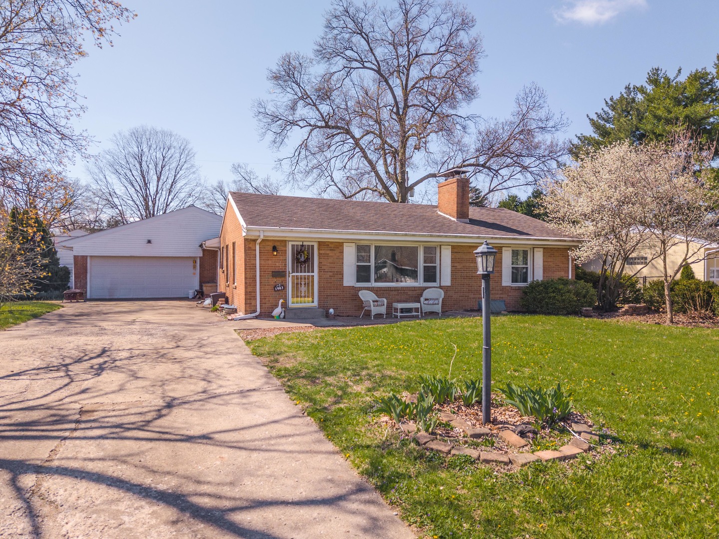 1903 Croxton Avenue Bloomington, IL 61701 - Photo 48 of 55 a front view of a house with a yard