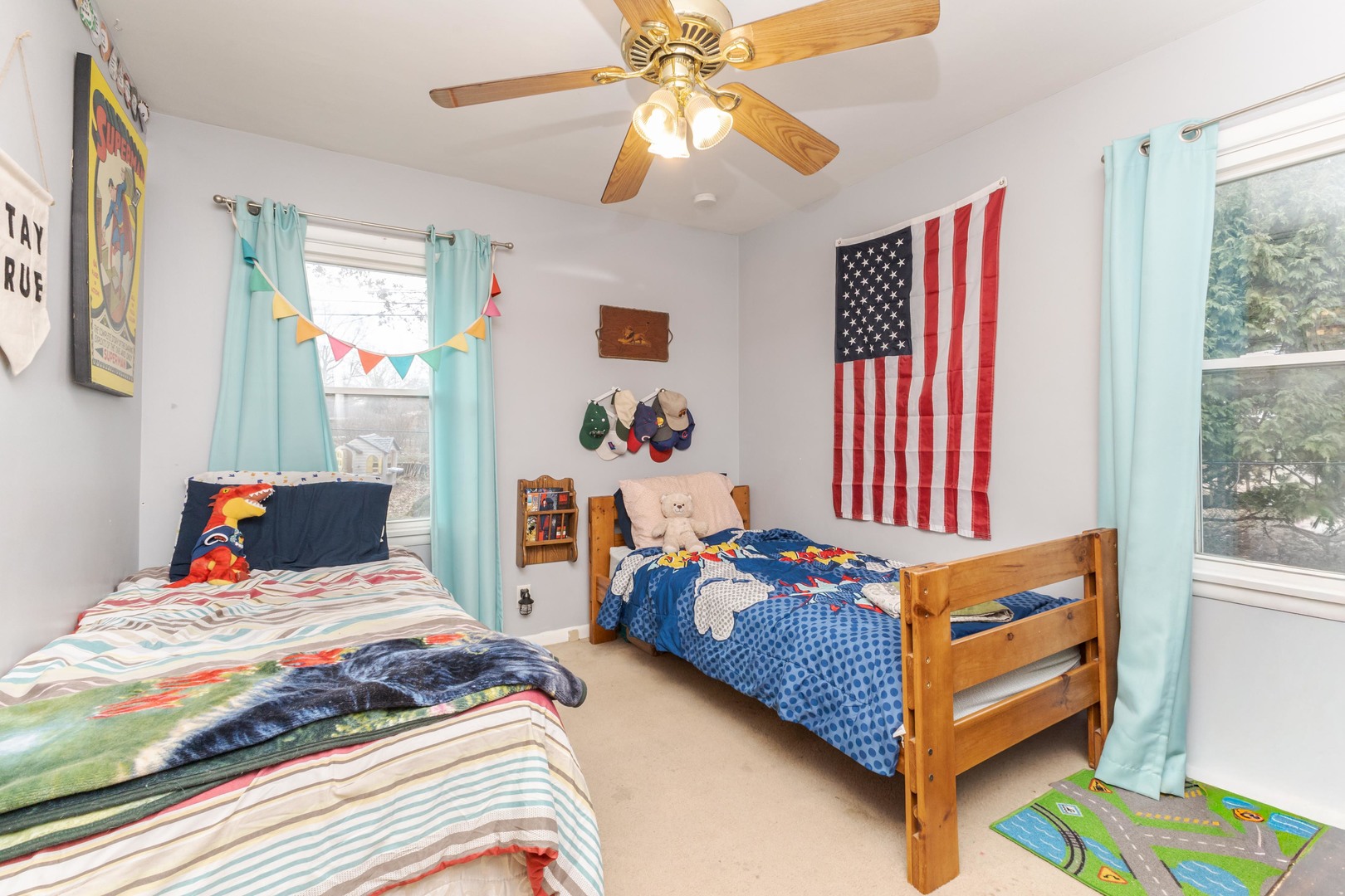 1903 Croxton Avenue Bloomington, IL 61701 - Photo 10 of 55 a bedroom with two beds and a chandelier