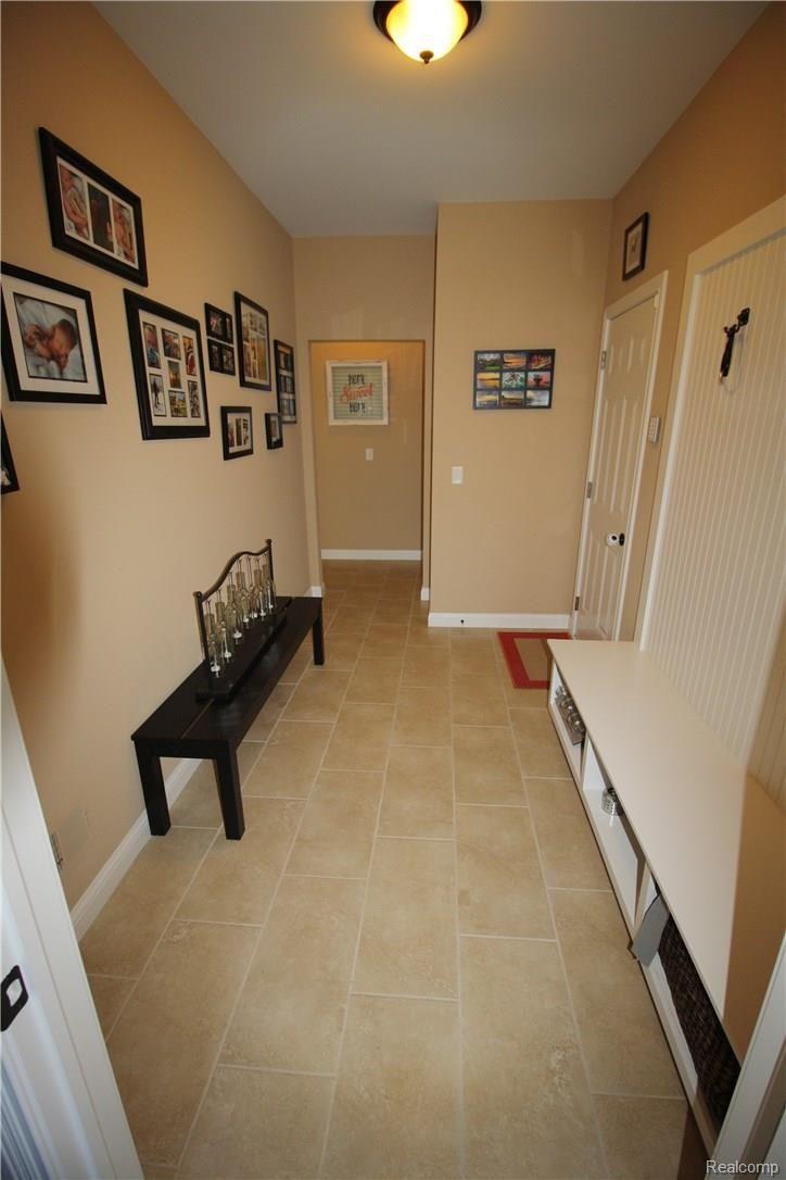 8608 East Pearson Road Utica, MI 48316 - Photo 16 of 44 Large mudroom with cute bench.