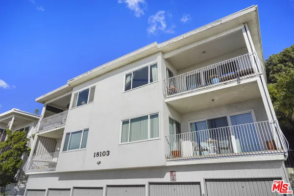 a front view of a house with balcony
