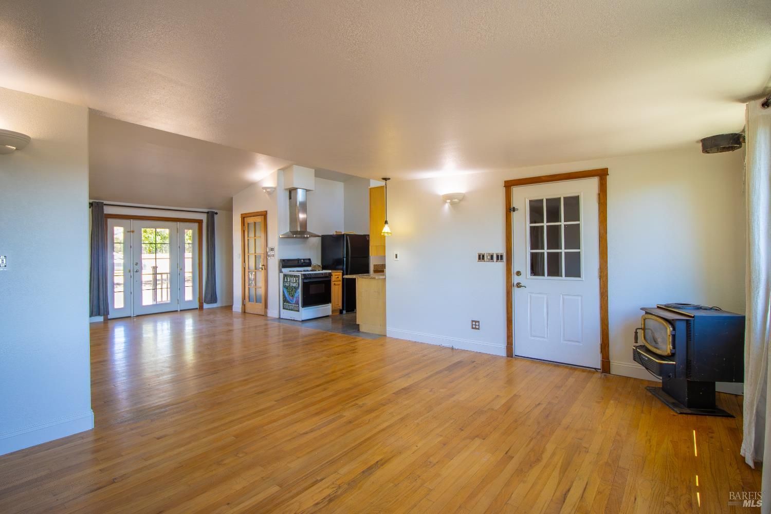 2901-2903 Rd I, Unit AC Redwood Valley, CA 95470 - Photo 32 of 61 Living room with view to kitchen.