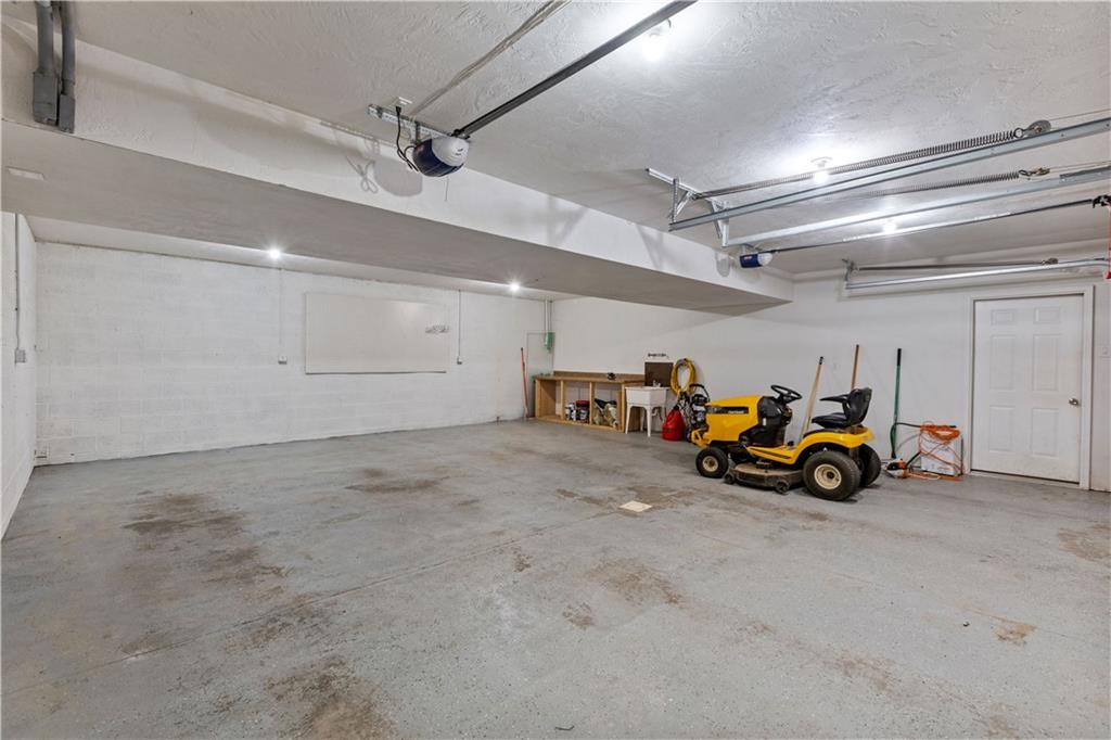 509 Quail Hill Road Normalville, PA 15469 - Photo 21 of 26 a view of the garage with parked cars