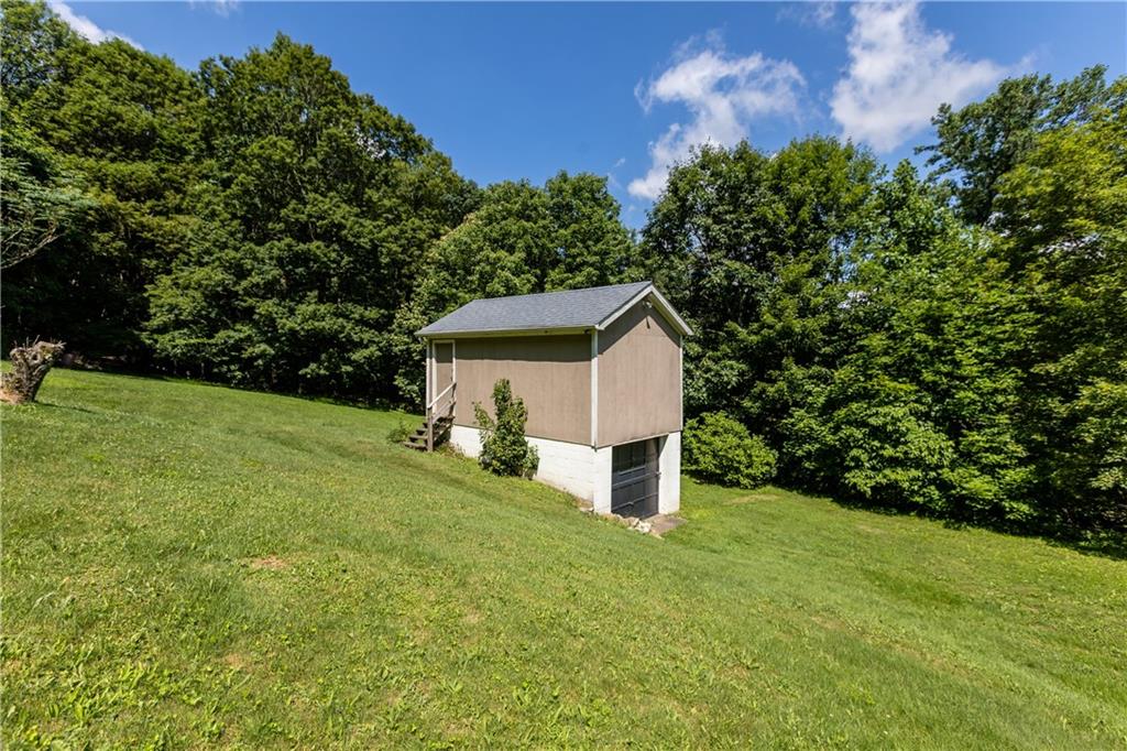 509 Quail Hill Road Normalville, PA 15469 - Photo 26 of 26 a view of a house with backyard