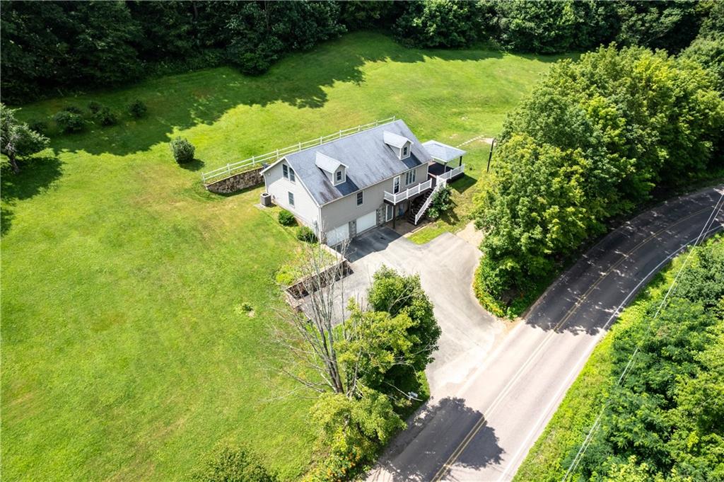 509 Quail Hill Road Normalville, PA 15469 - Photo 3 of 26 an aerial view of a house with a yard basket ball court and outdoor seating