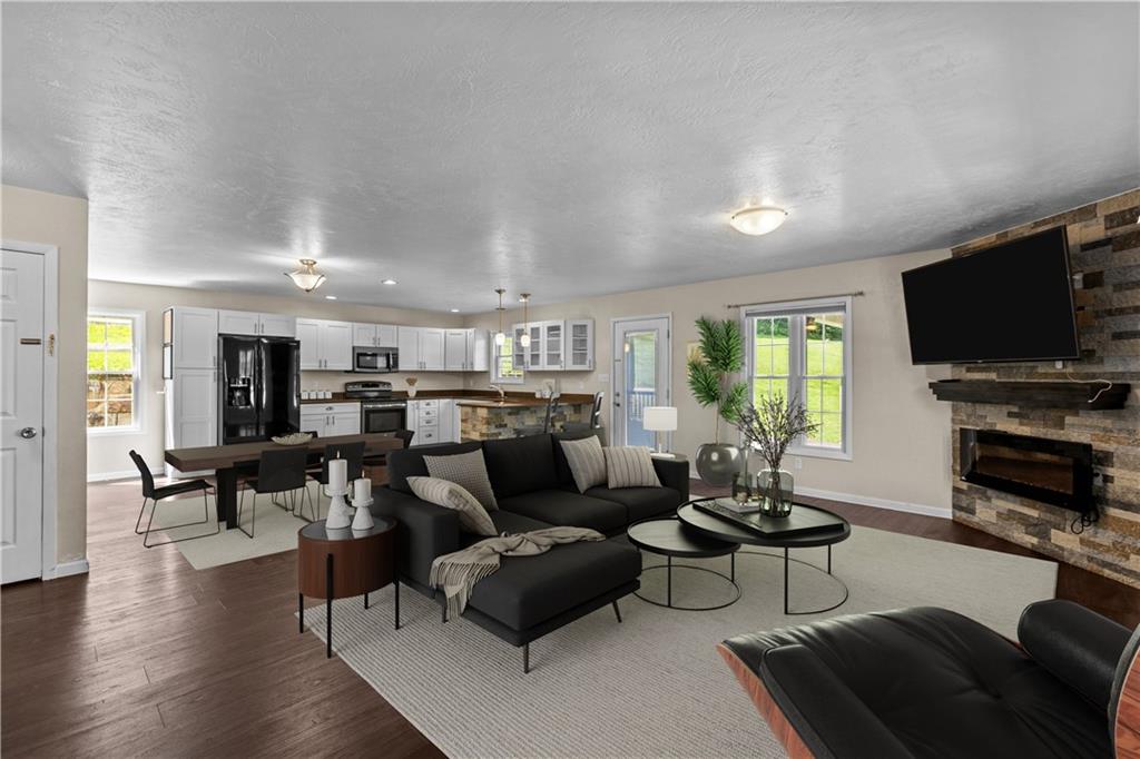 509 Quail Hill Road Normalville, PA 15469 - Photo 4 of 26 a living room with furniture and a flat screen tv