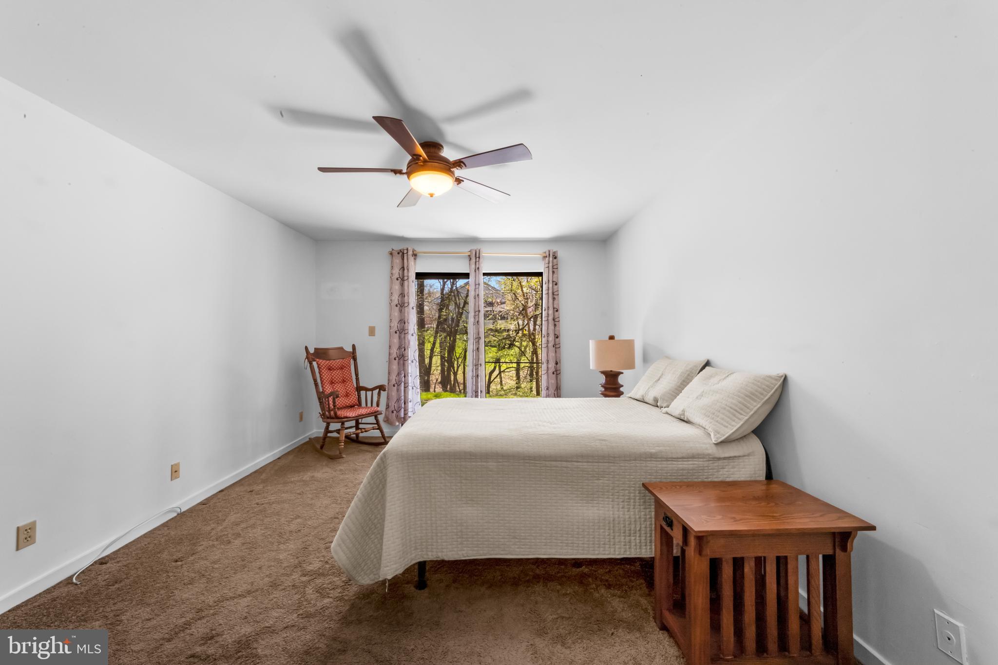 1202 Augusta Circle Mount Laurel, NJ 08054 - Photo 15 of 25 a bedroom with a bed a window and dresser