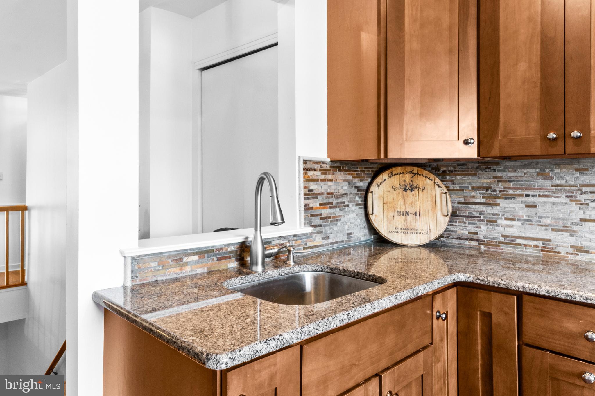 1202 Augusta Circle Mount Laurel, NJ 08054 - Photo 10 of 25 a kitchen with sink and mirror
