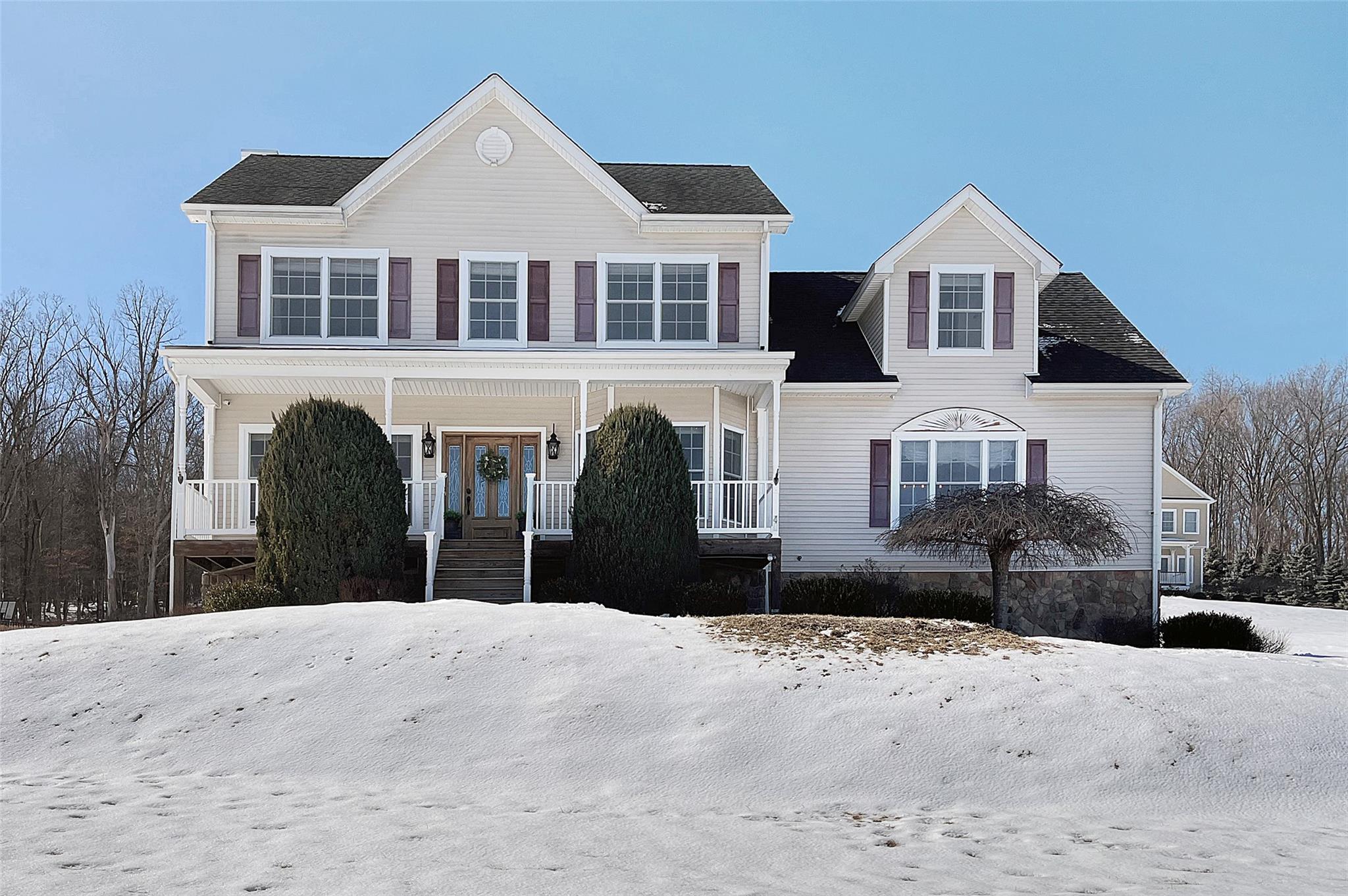 View of front of property featuring a porch