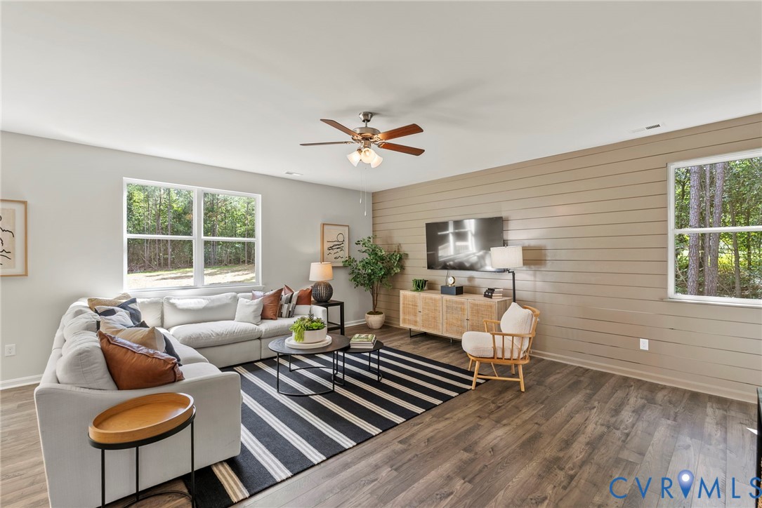 7745 Arbor Marsh Terrace New Kent, VA 23124 - Photo 12 of 30 a living room with furniture and a window