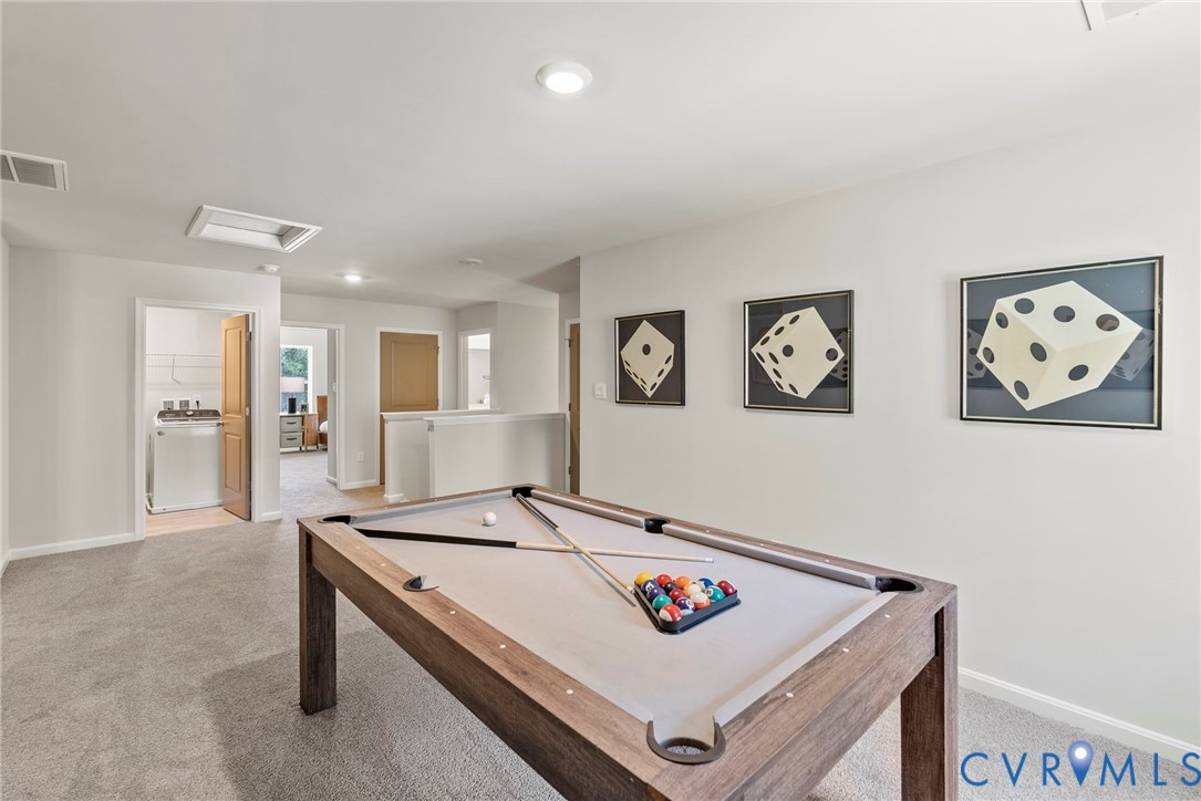 7745 Arbor Marsh Terrace New Kent, VA 23124 - Photo 14 of 30 a view of a livingroom with furniture and a table