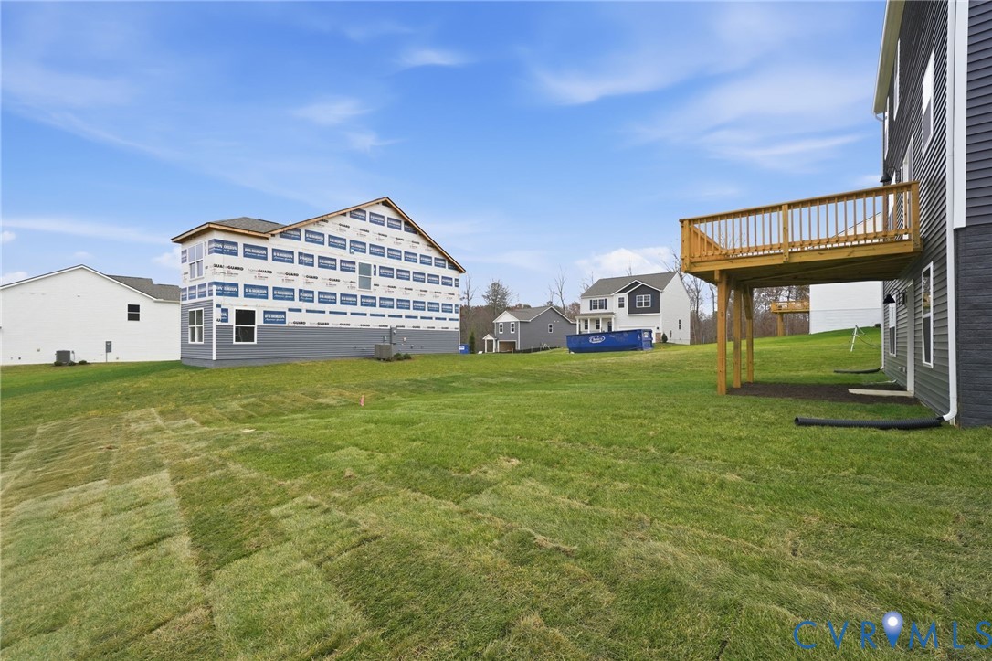 7745 Arbor Marsh Terrace New Kent, VA 23124 - Photo 27 of 30 a view of a house with a yard
