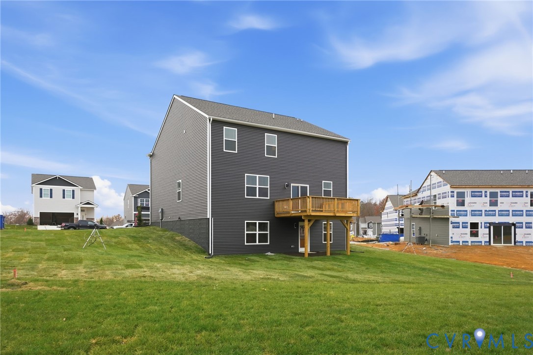 7745 Arbor Marsh Terrace New Kent, VA 23124 - Photo 29 of 30 a view of a house with a big yard
