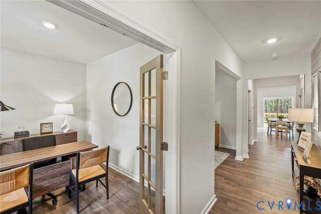 7745 Arbor Marsh Terrace New Kent, VA 23124 - Photo 5 of 30 a view of a room that has a table and a chair