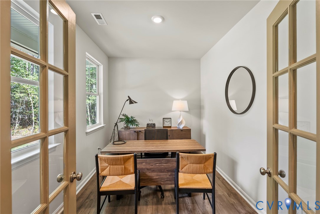7745 Arbor Marsh Terrace New Kent, VA 23124 - Photo 6 of 30 a dining room with furniture and a window