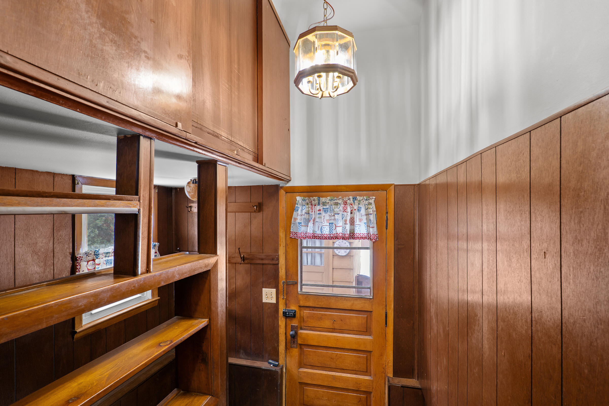 851 North 10th Street Manitowoc, WI 54220 - Photo 28 of 39 This leads to the deck. If you go left, you will head to the rec room.