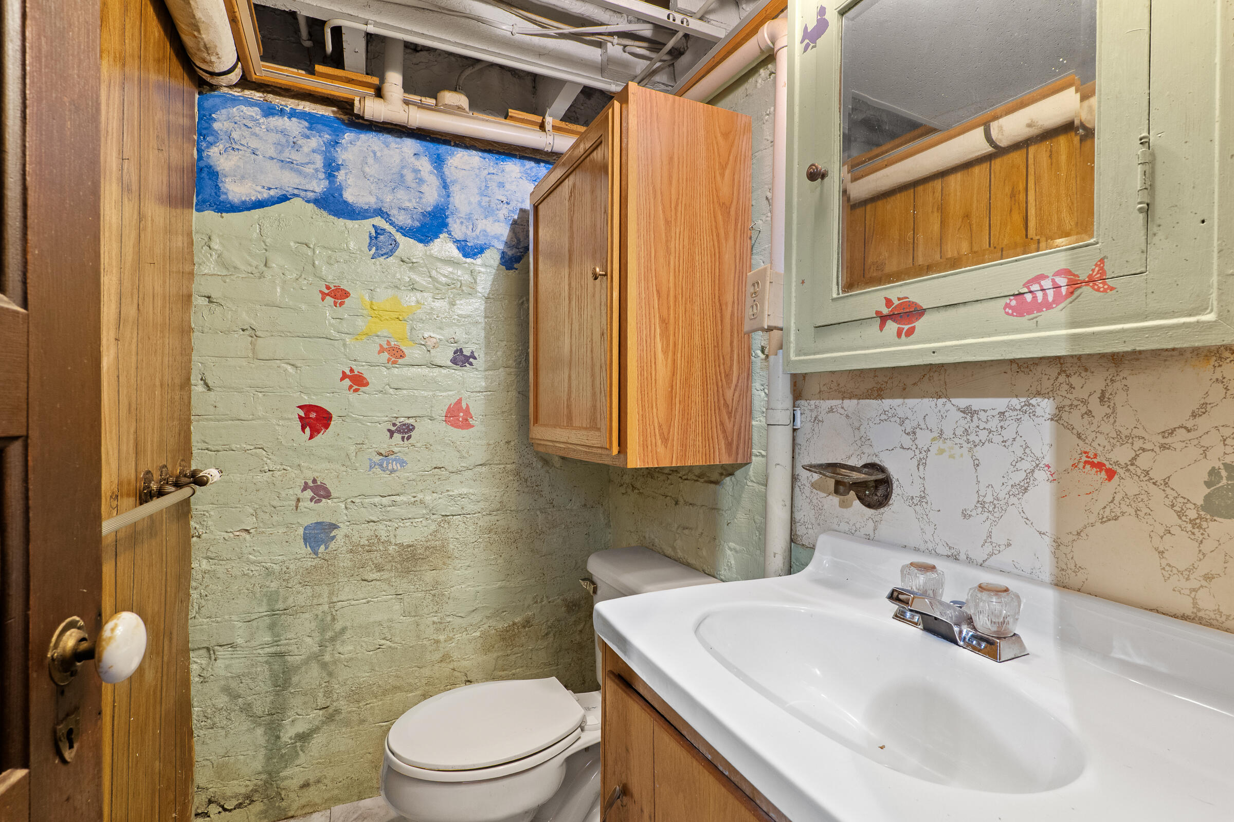 851 North 10th Street Manitowoc, WI 54220 - Photo 30 of 39 1/2 bath in the rec area