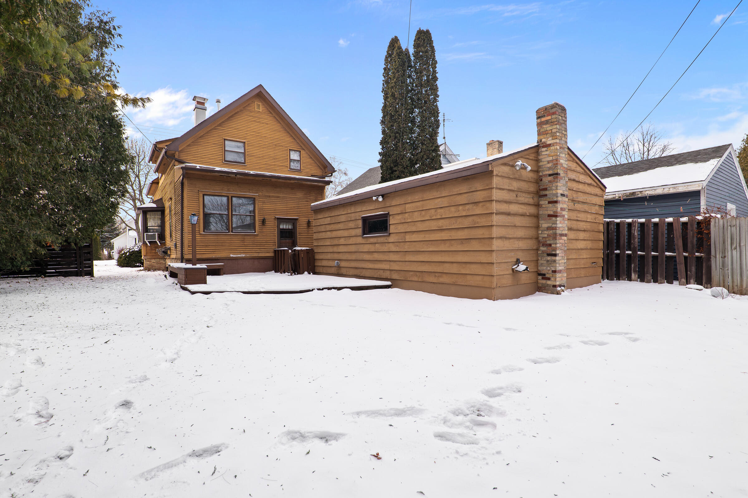 851 North 10th Street Manitowoc, WI 54220 - Photo 37 of 39 Mostly fenced yard