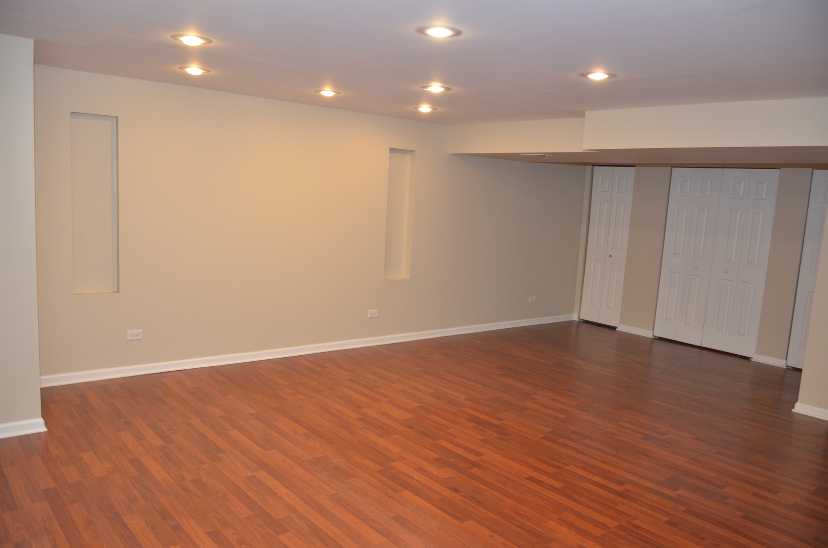 408 North River Road, Unit 408 Naperville, IL 60540 - Photo 30 of 36 a view of an empty room with wooden floor and entryway