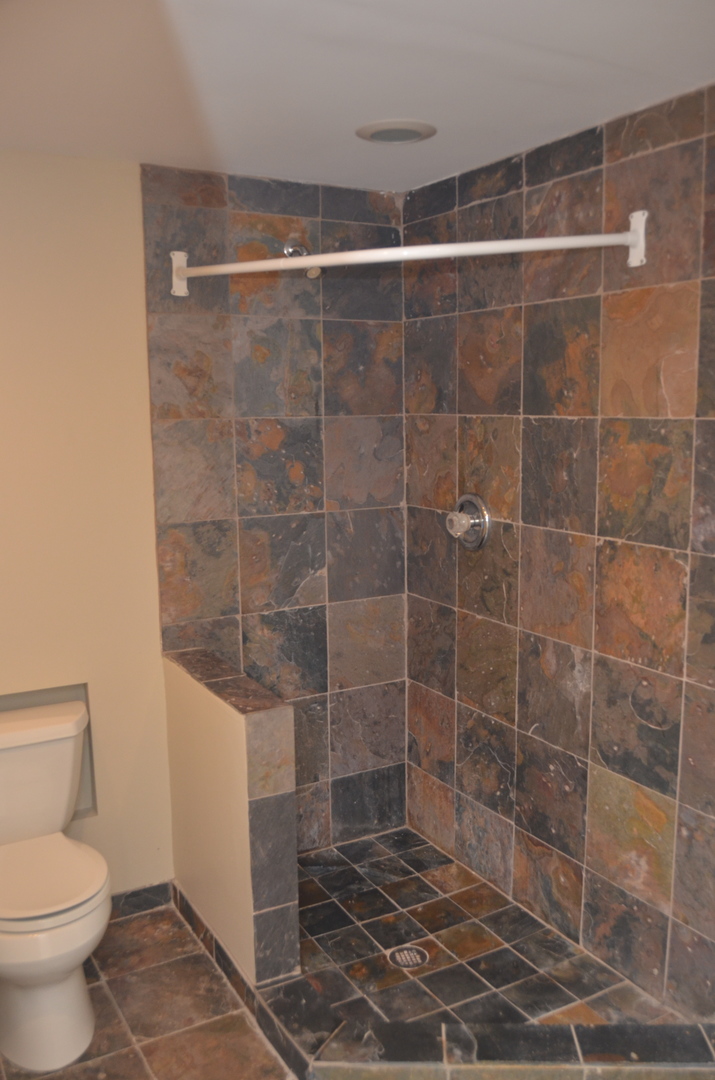 408 North River Road, Unit 408 Naperville, IL 60540 - Photo 31 of 36 a bathroom with a toilet and a shower