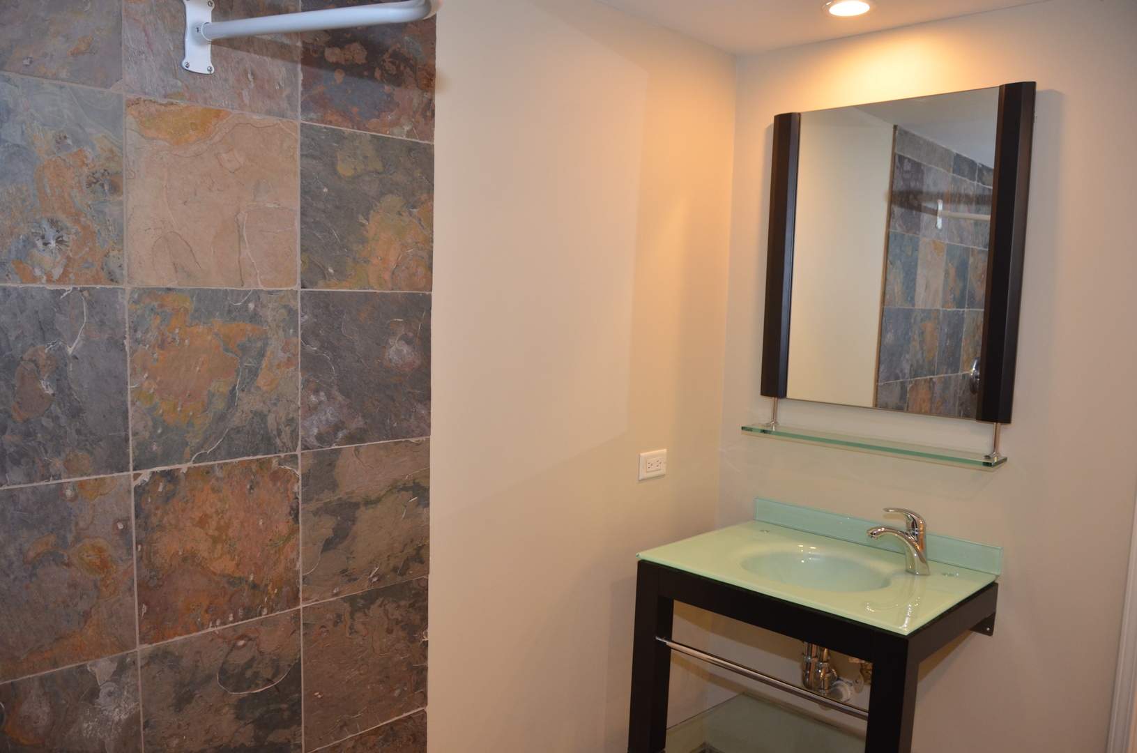408 North River Road, Unit 408 Naperville, IL 60540 - Photo 32 of 36 a bathroom with a sink vanity and a mirror