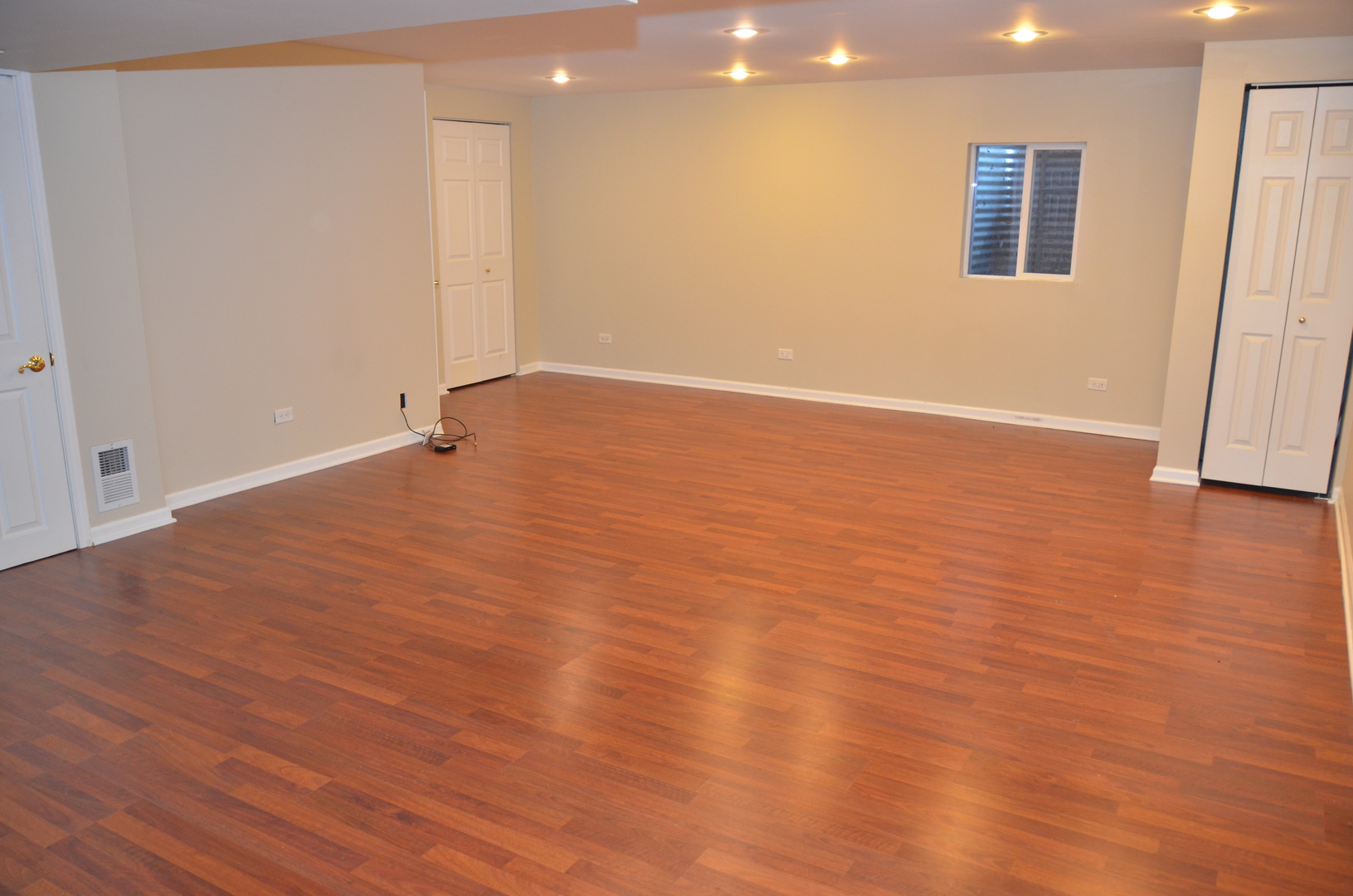 408 North River Road, Unit 408 Naperville, IL 60540 - Photo 34 of 36 an empty room with wooden floor and windows