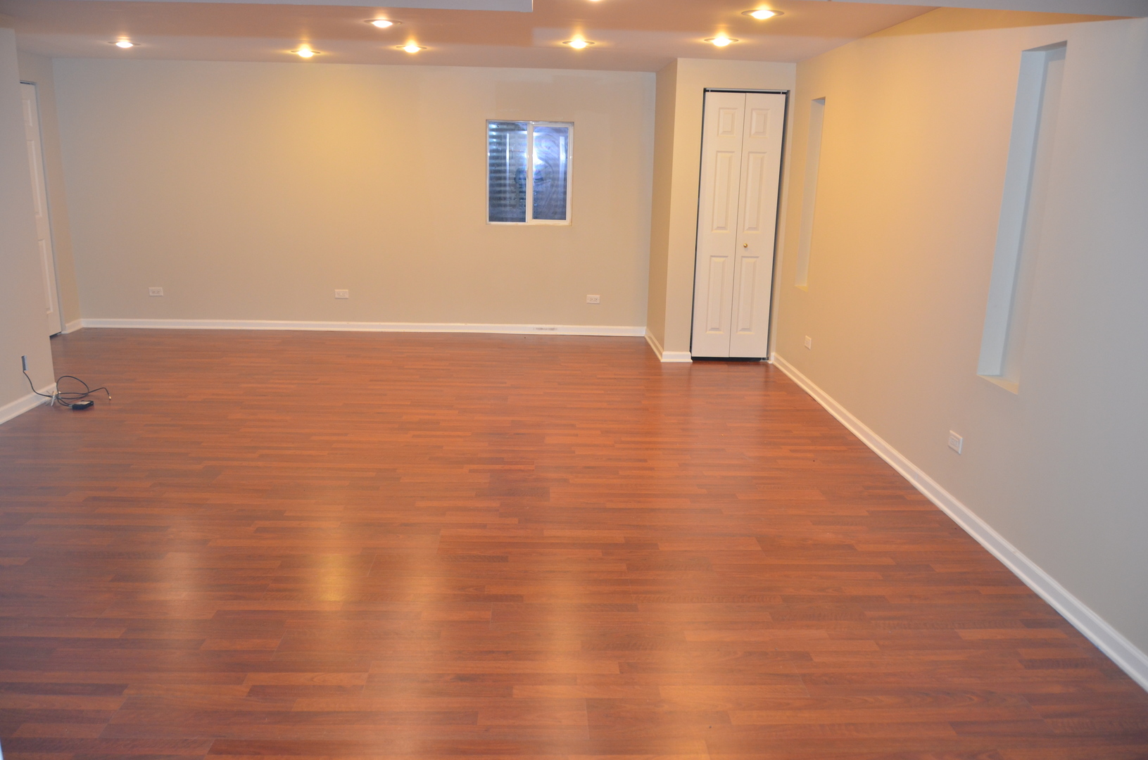 408 North River Road, Unit 408 Naperville, IL 60540 - Photo 35 of 36 an empty room with wooden floor and windows