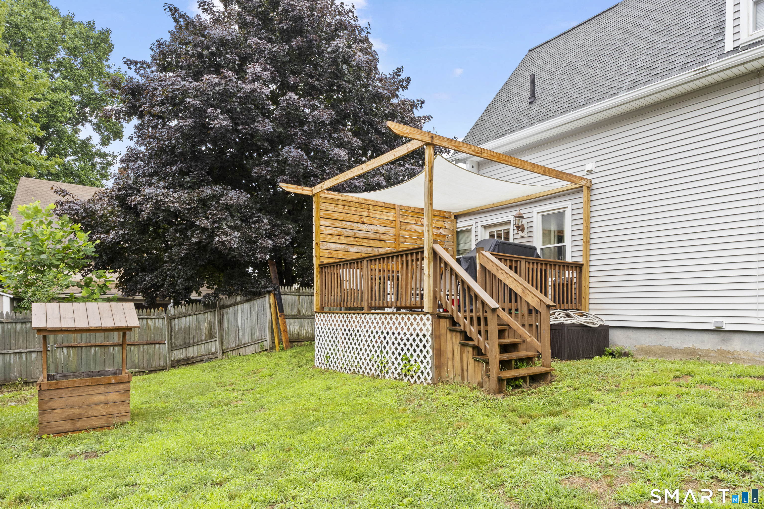 47 Broad Street Killingly, CT 06239 - Photo 32 of 33 a view of a house with wooden fence