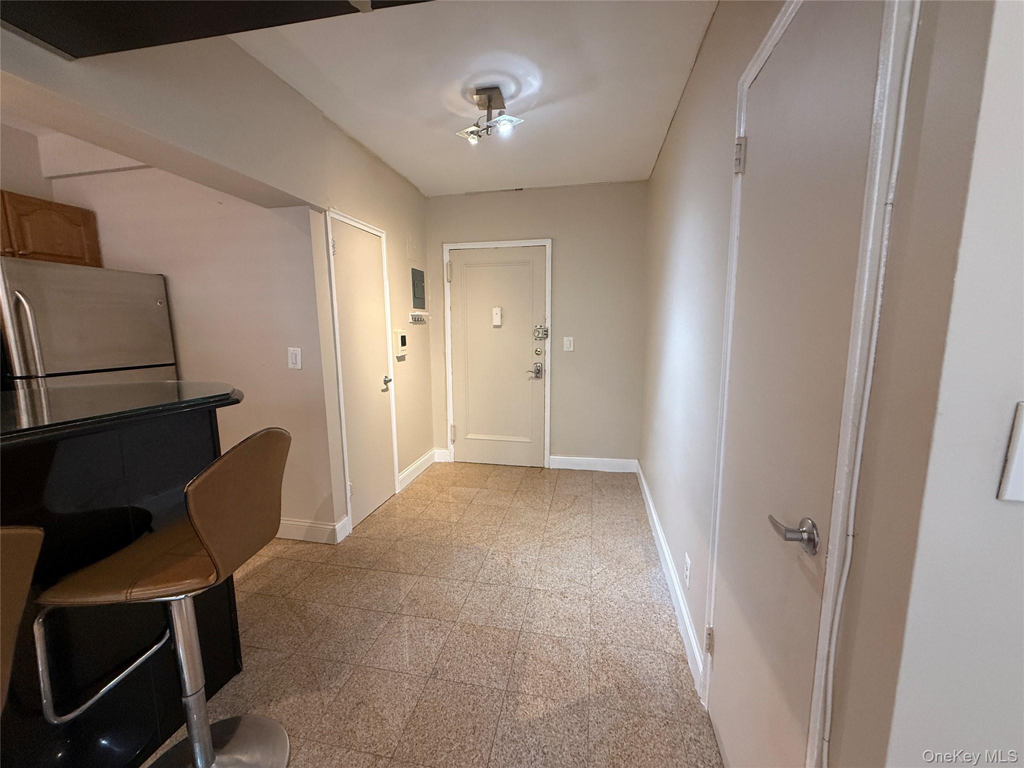 796 Bronx River Road, Unit B38 Bronxville, NY 10708 - Photo 23 of 31 a view of workspace with furniture and wooden floor