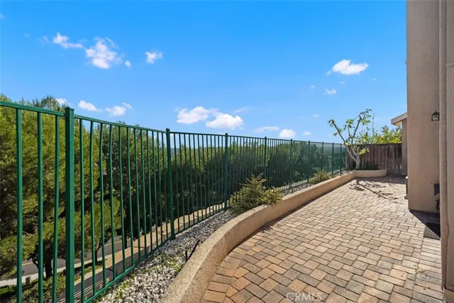 a view of a pathway with a yard