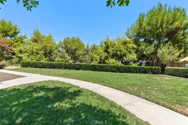 a view of a building with a street