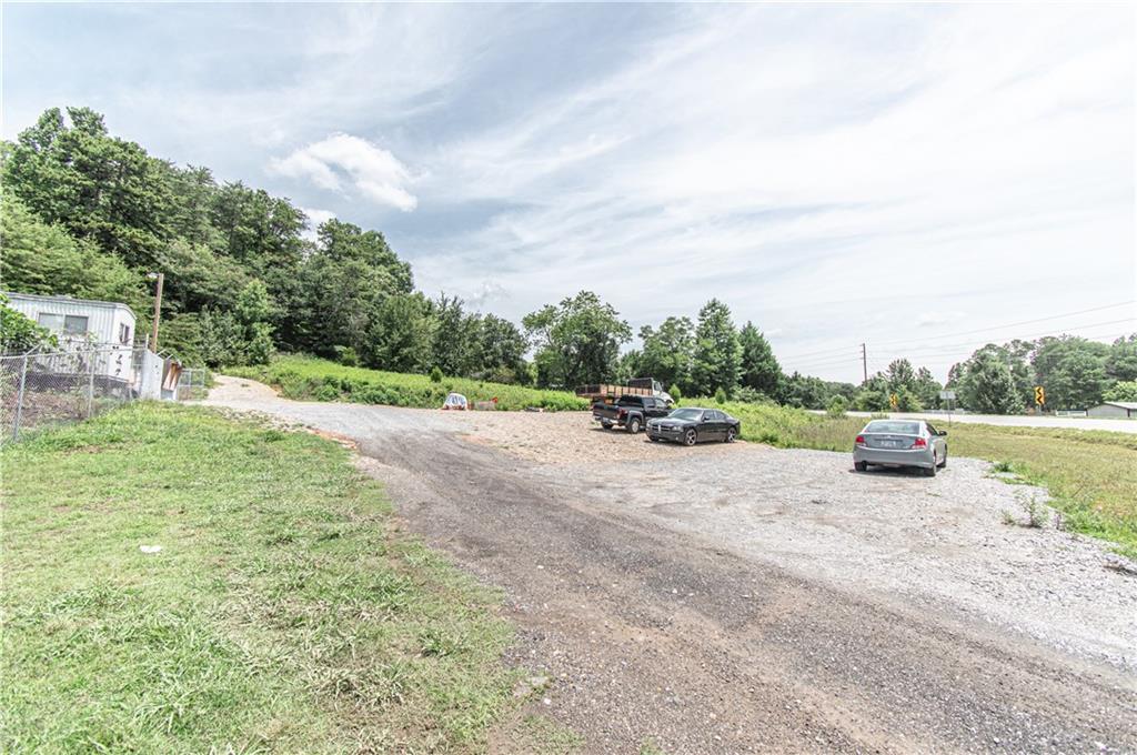 5646 Price Road Gainesville, GA 30506 - Photo 5 of 11 a view of a road with a yard