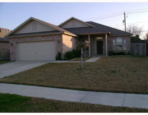 5829 Corsica Road Corpus Christi, TX 78414 - Photo 1 of 1 a front view of a house with garden